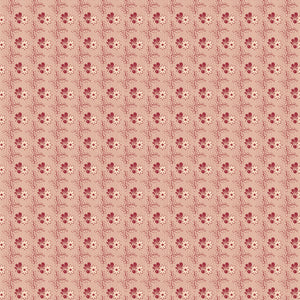 Northanger Abbey Richard fabric with small red floral motifs in a delicate repeat on pale peach.