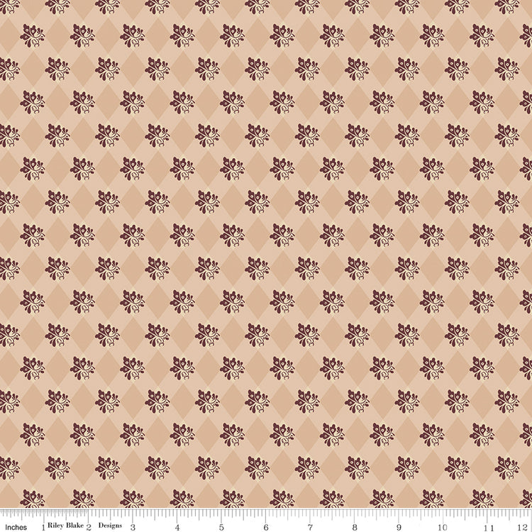 Northanger Abbey James fabric with plum floral sprigs over a tan and cream diamond pattern with ruler for scale.