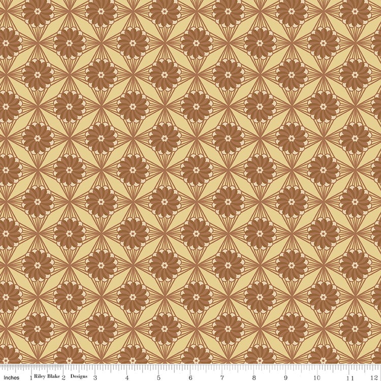 Northanger Abbey Fullerton fabric with brown flowers and radiating geometric lines on warm tan with ruler for scale.