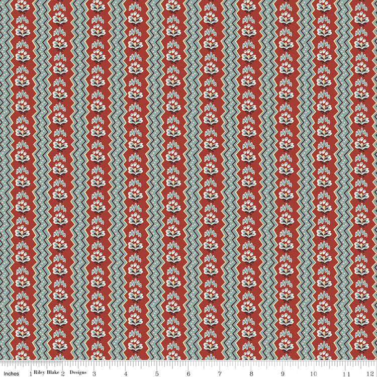 Northanger Abbey General fabric with rust floral stripes, teal accents, and cream zigzag bands with ruler for scale.