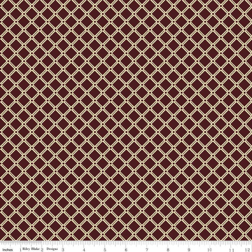 Northanger Abbey Tilney Merlot fabric with cream lattice diamonds on a deep merlot background with ruler for scale.