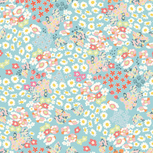 Cotton Nook Flowerbed Aqua fabric with daisies, strawberries and colorful flowers on aqua.