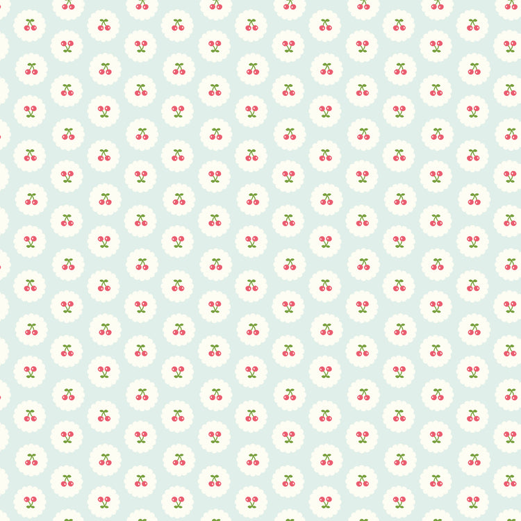 Cotton Nook Cherries Bleached Denim fabric with tiny cherries in white scalloped circles.