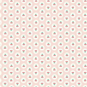Cotton Nook Cherries Blush fabric with red cherries inside white scalloped circles on pale pink.