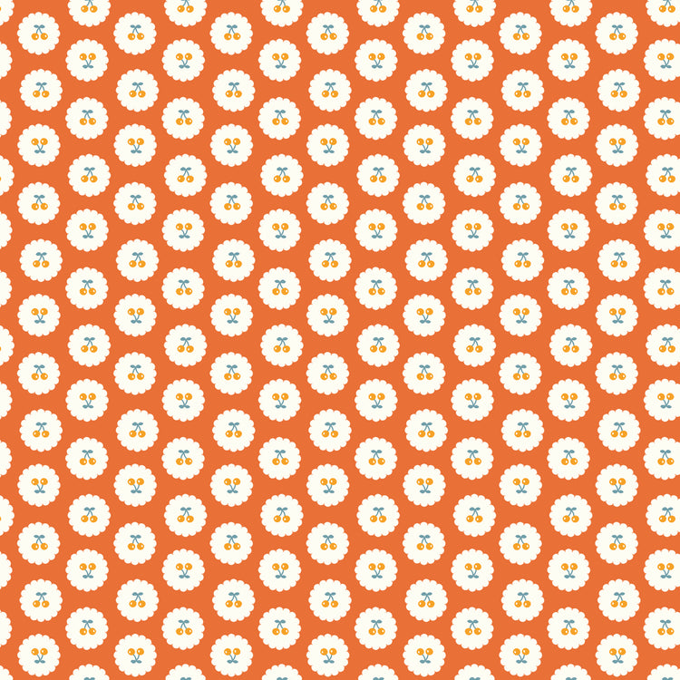 Cotton Nook Cherries Orange fabric with golden cherries in white scalloped circles on orange.