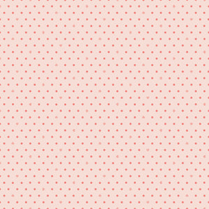 Cotton Nook Dots Blush fabric with small coral dots scattered across a pale blush background.