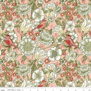 Blush pink floral fabric with cream flowers, green leaves, and coral birds with a ruler along the bottom for scale. 