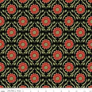 Black fabric with repeating red floral medallions and olive green vines with a ruler along the bottom for scale