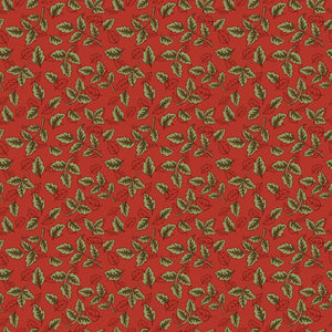 Red fabric with scattered olive green leafy sprigs