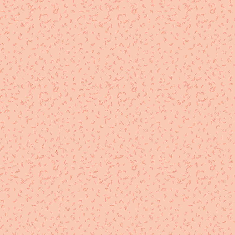 Blush pink fabric with scattered tiny coral leaf motifs