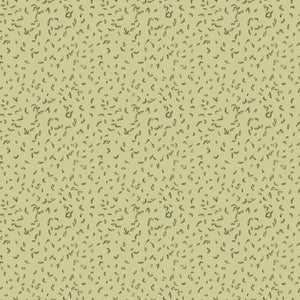 Celery green fabric with scattered tiny dark green leaf motifs