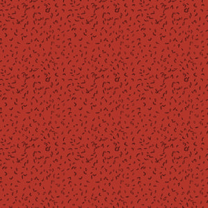 Red fabric with scattered tiny dark leaf motifs.