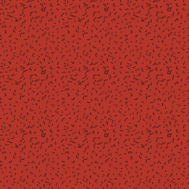 Red fabric with scattered tiny dark leaf motifs.