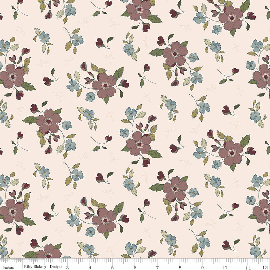 A floral pattern on a warm cream background, featuring muted mauve-pink flowers, small light blue blossoms, olive green leaves, and dark burgundy buds with ruler for scale.