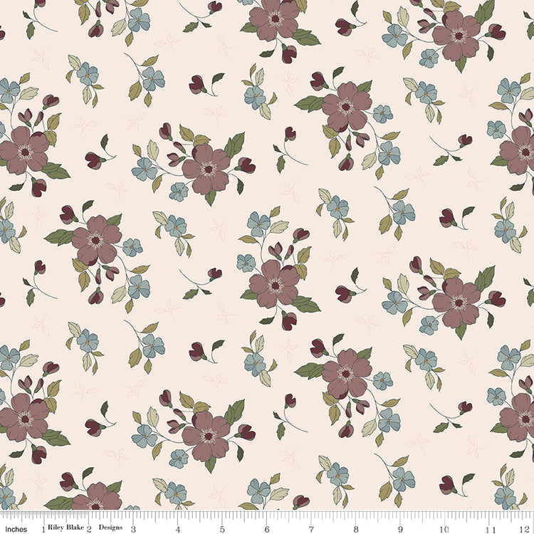 A floral pattern on a warm cream background, featuring muted mauve-pink flowers, small light blue blossoms, olive green leaves, and dark burgundy buds with ruler for scale.
