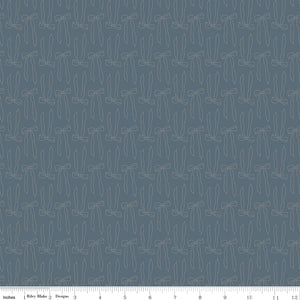 Bows Thunder fabric with slender taupe ribbon bow outlines and flowing tails on smoky blue-gray with ruler for scale.