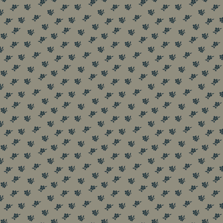 Magnolia Light Gray fabric with small charcoal-blue floral sprigs scattered across a warm gray background.