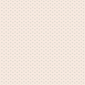 Lottie Latte fabric with tiny blue-gray leaf sprigs and dots in alternating rows on creamy ivory.