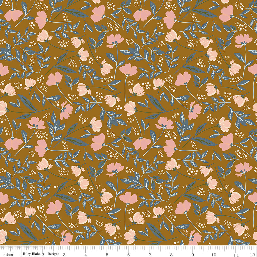 Main Butterscotch floral fabric with pink and peach blossoms, dusty blue leaves, and a warm golden background with ruler for scale.