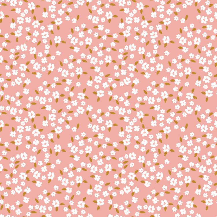 Blossoms Coral fabric with scattered white flowers and golden ochre leaves on a coral-pink background.
