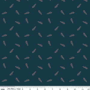 Toss Blue fabric with delicate dusty pink leafy sprigs scattered on a deep teal-blue background with ruler for scale.