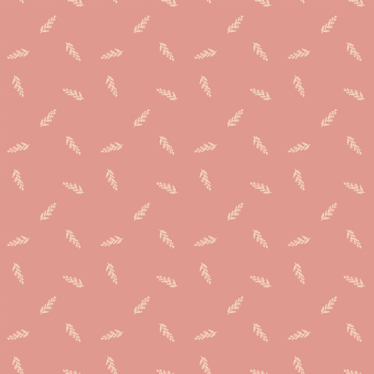 Toss Coral fabric with small cream leafy sprigs tossed across a muted coral-pink background.