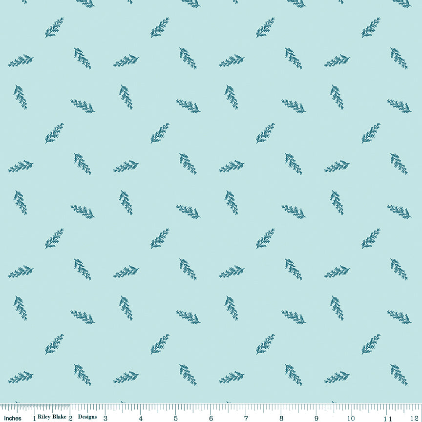 Toss Powder fabric with dark teal leafy sprigs scattered across a pale aqua background with ruler for scale.