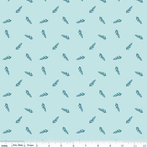 Toss Powder fabric with dark teal leafy sprigs scattered across a pale aqua background with ruler for scale.