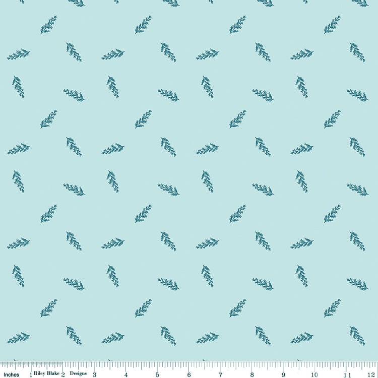 Toss Powder fabric with dark teal leafy sprigs scattered across a pale aqua background with ruler for scale.