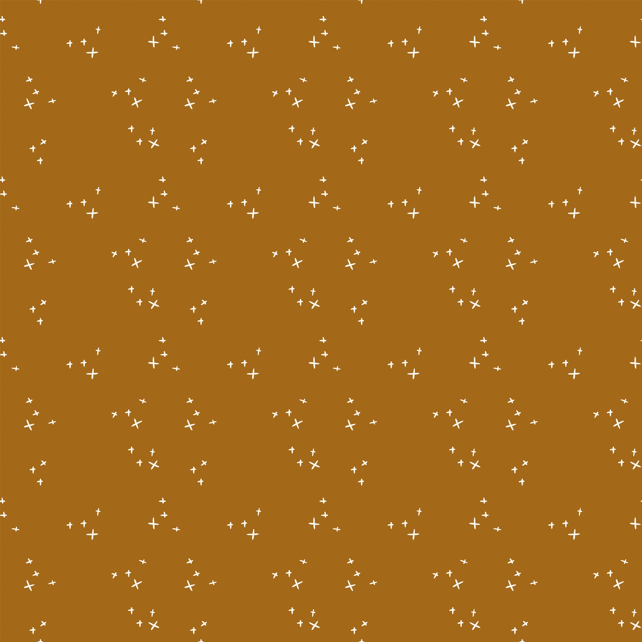 Scatter Butterscotch fabric with scattered cream crosses on a warm golden ochre background.
