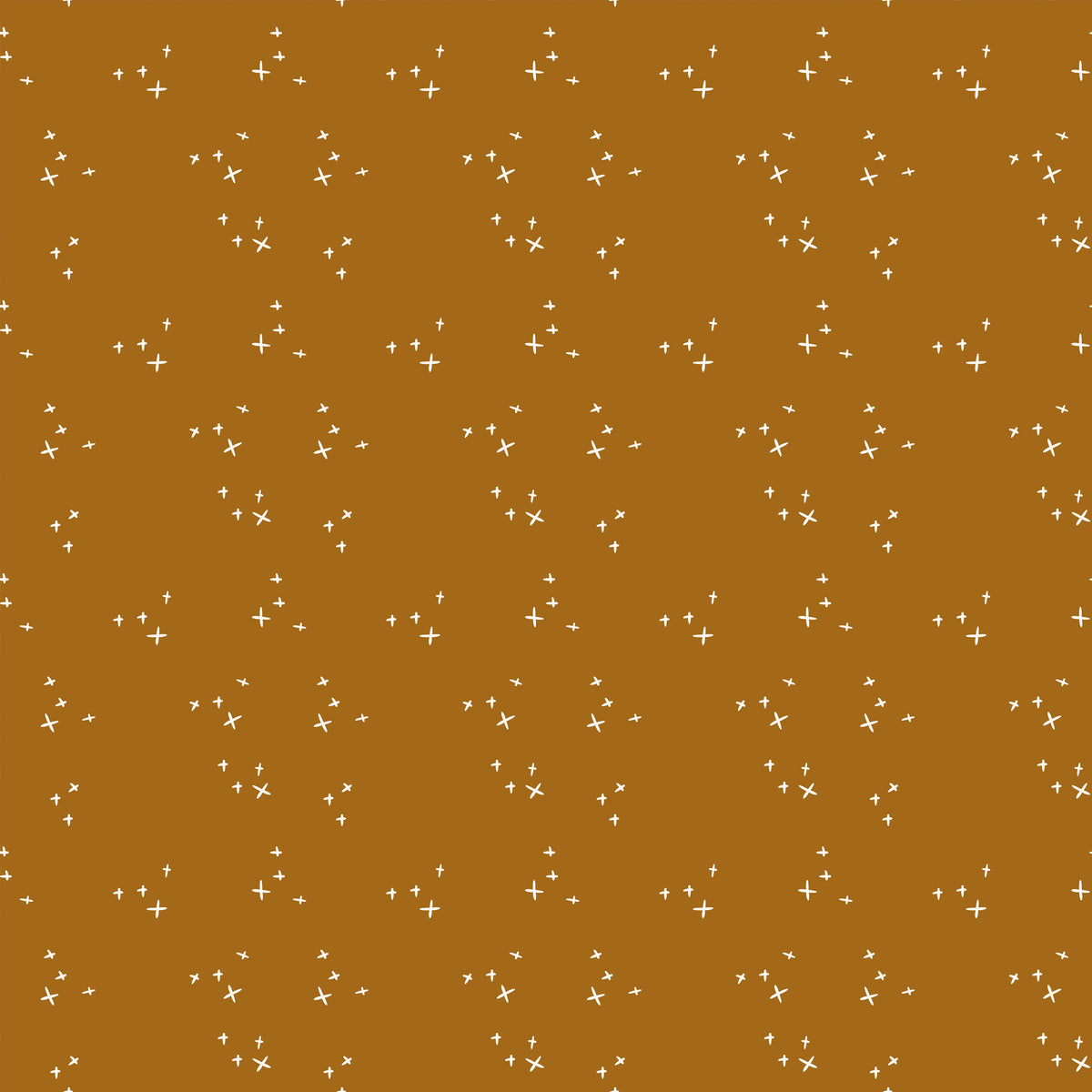 Scatter Butterscotch fabric with scattered cream crosses on a warm golden ochre background.