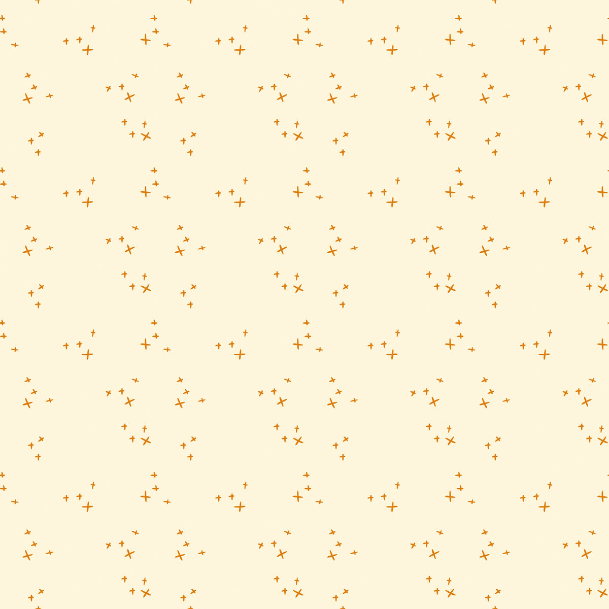 Scatter Cream fabric with small golden-orange crosses arranged in loose clusters on a pale cream background.