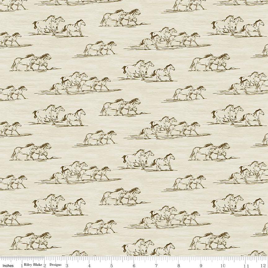 Horse Toile Cream fabric with brown sketches of running horses on a softly textured cream background with ruler for scale.