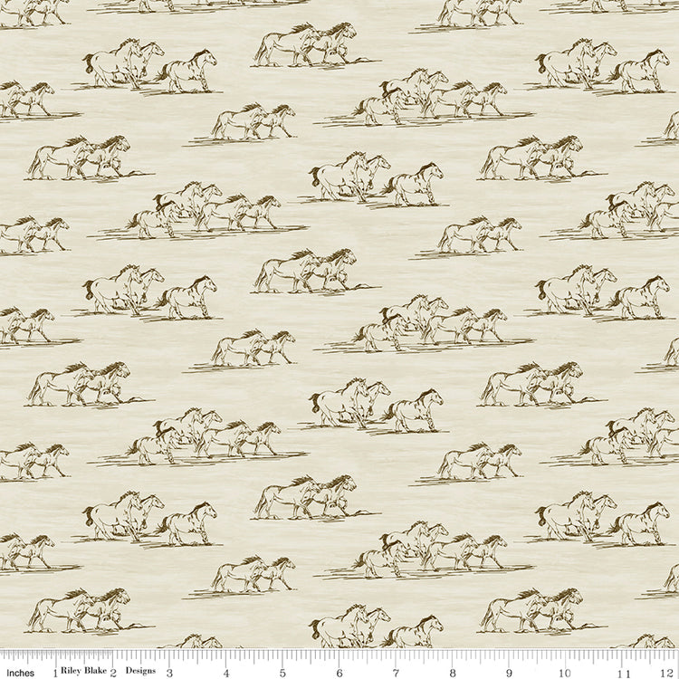 Horse Toile Cream fabric with brown sketches of running horses on a softly textured cream background with ruler for scale.