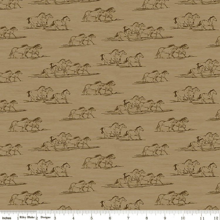 Horse Toile Tan fabric with brown line drawings of running horses on a sandy tan background with ruler for scale.