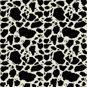 Cow Patches Black fabric with irregular black cowhide-style spots on a creamy off-white background.