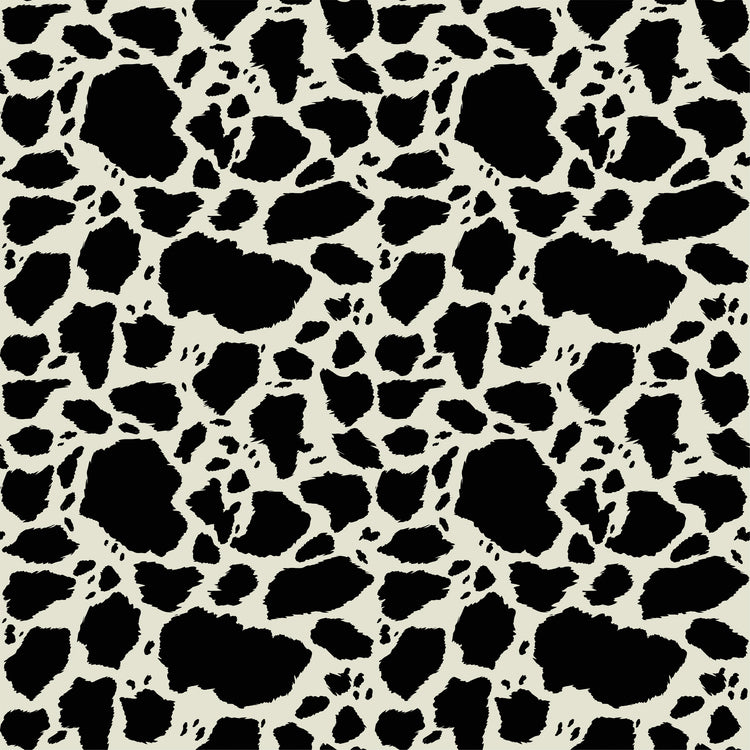 Cow Patches Black fabric with irregular black cowhide-style spots on a creamy off-white background.