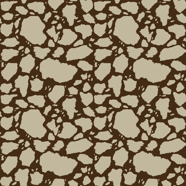 Cow Patches Tan fabric with sandy tan cowhide-style patches on a deep brown background.