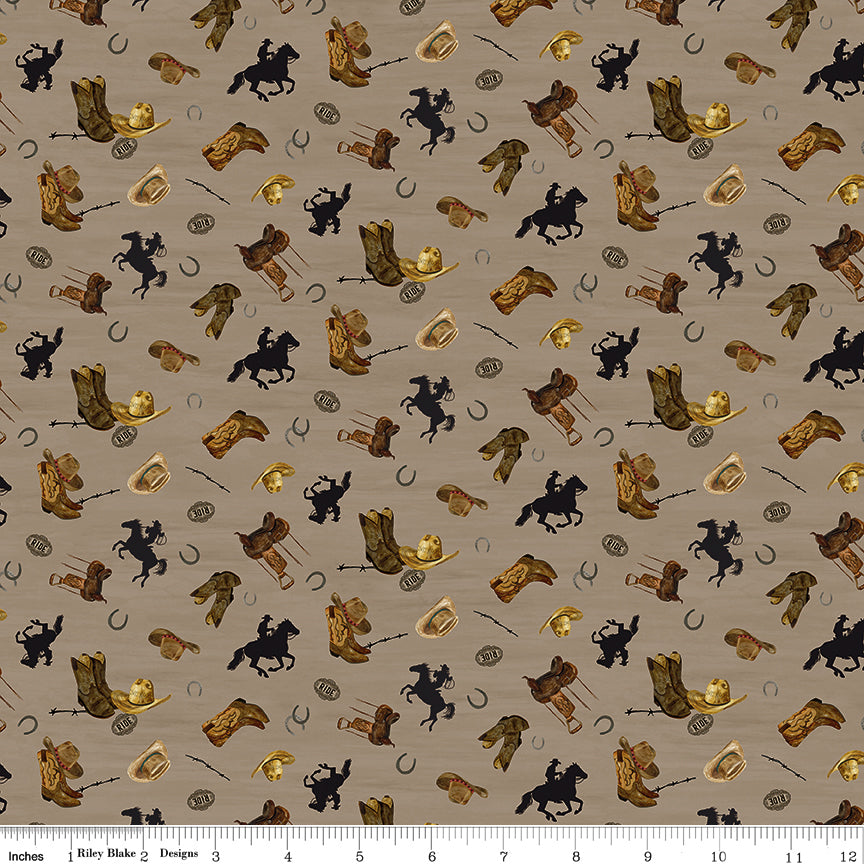 Icon Toss Tan fabric with brown boots, hats, saddles, horseshoes, and black horseback riders on tan with ruler for scale.