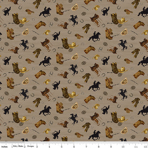 Icon Toss Tan fabric with brown boots, hats, saddles, horseshoes, and black horseback riders on tan with ruler for scale.