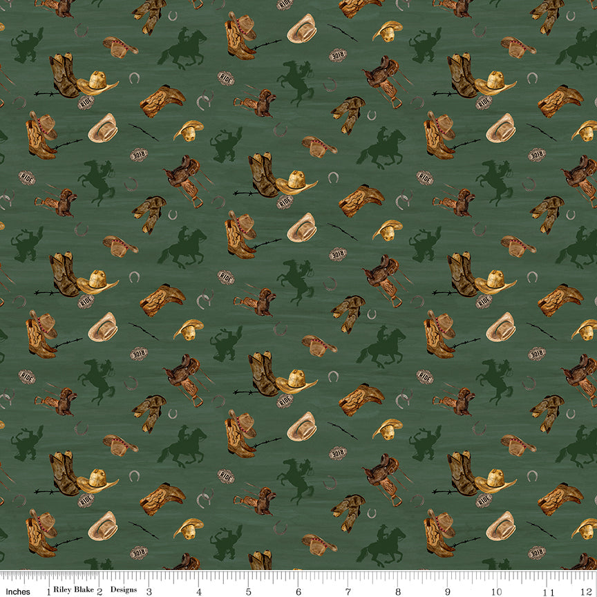 Icon Toss Teal fabric with cowboy boots, hats, saddles, horseshoes, and dark green horseback riders on muted teal with ruler for scale.