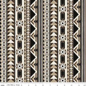 A repeating geometric pattern featuring vertical bands of triangles, diamonds, and stripes in black, beige, and white with ruler for scale.