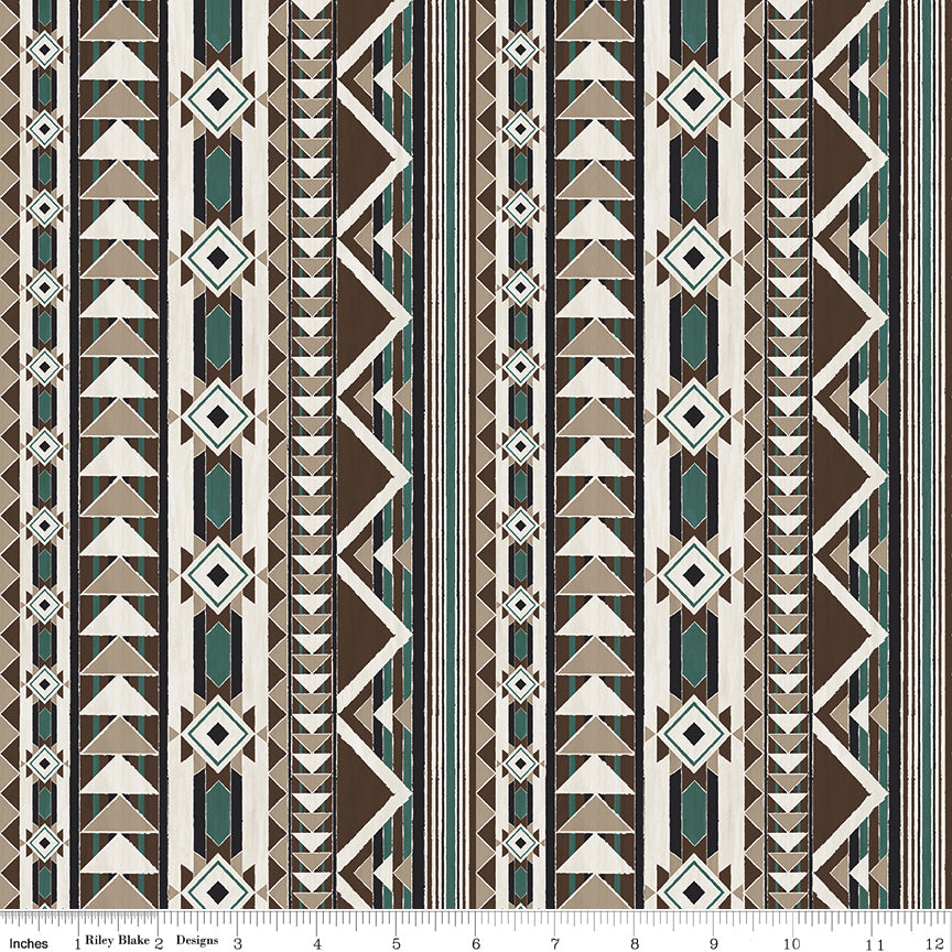 A repeating geometric pattern with vertical stripes featuring triangles, diamonds, and zigzags in brown, beige, white, and teal with ruler for scale.