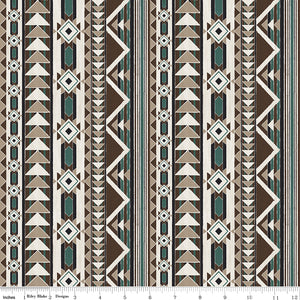 A repeating geometric pattern with vertical stripes featuring triangles, diamonds, and zigzags in brown, beige, white, and teal with ruler for scale.