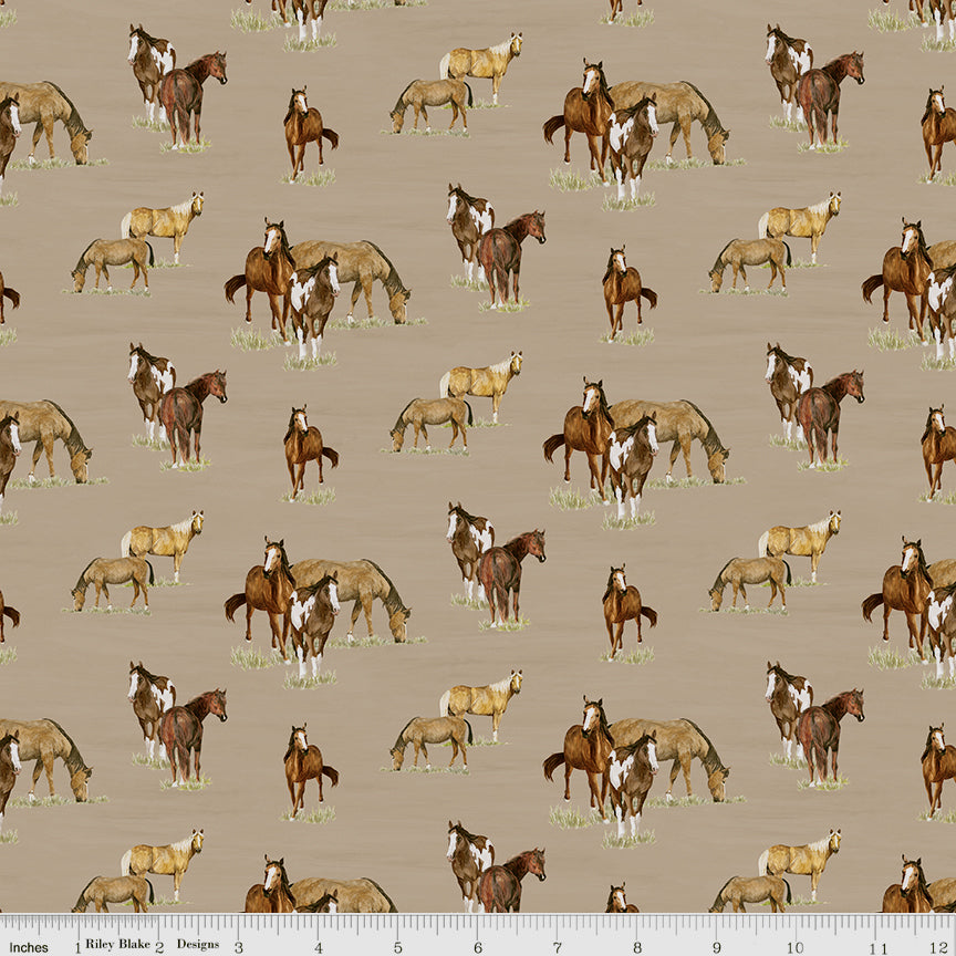 A pattern of various horse breeds, including foals and adults in brown, white, and tan, set against a solid taupe background with ruler for scale.