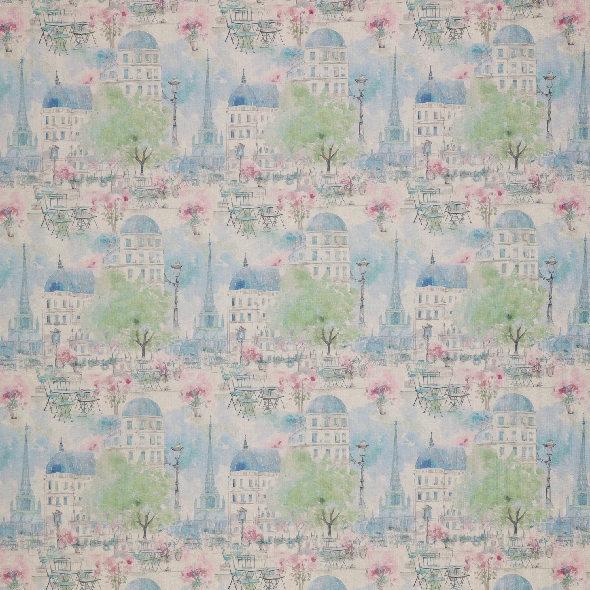 En Vogue Fabric Collection - Paris en Vogue Blue: watercolor-style pattern featuring Parisian buildings, trees, flowers, and street scenes in soft blue, pink, green, and white tones CL64250101-02