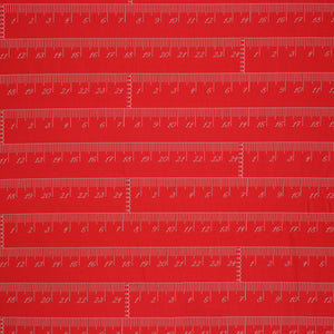 En Vogue Fabric Collection - Chic Rulers Coral: red coral fabric with a repeating pattern of white printed rulers showing inch and centimeter measurements CL64250107-01