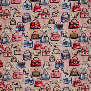 En Vogue Fabric Collection - Handbag Boutique: colorful handbags, high heels, and small flowers on a dusty pink background CL64260105-01