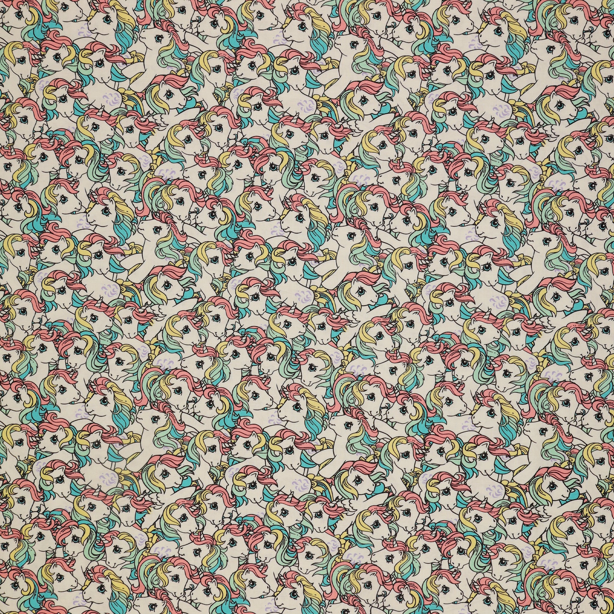 My Little Pony Retro Fabric Collection - Pony Stack: cartoon unicorns with pastel pink, yellow, and teal manes on a white background CL95010203-01