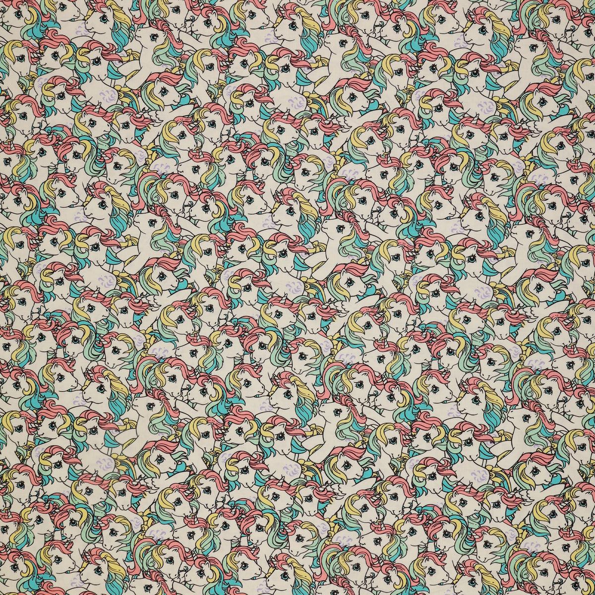 My Little Pony Retro Fabric Collection - Pony Stack: cartoon unicorns with pastel pink, yellow, and teal manes on a white background CL95010203-01